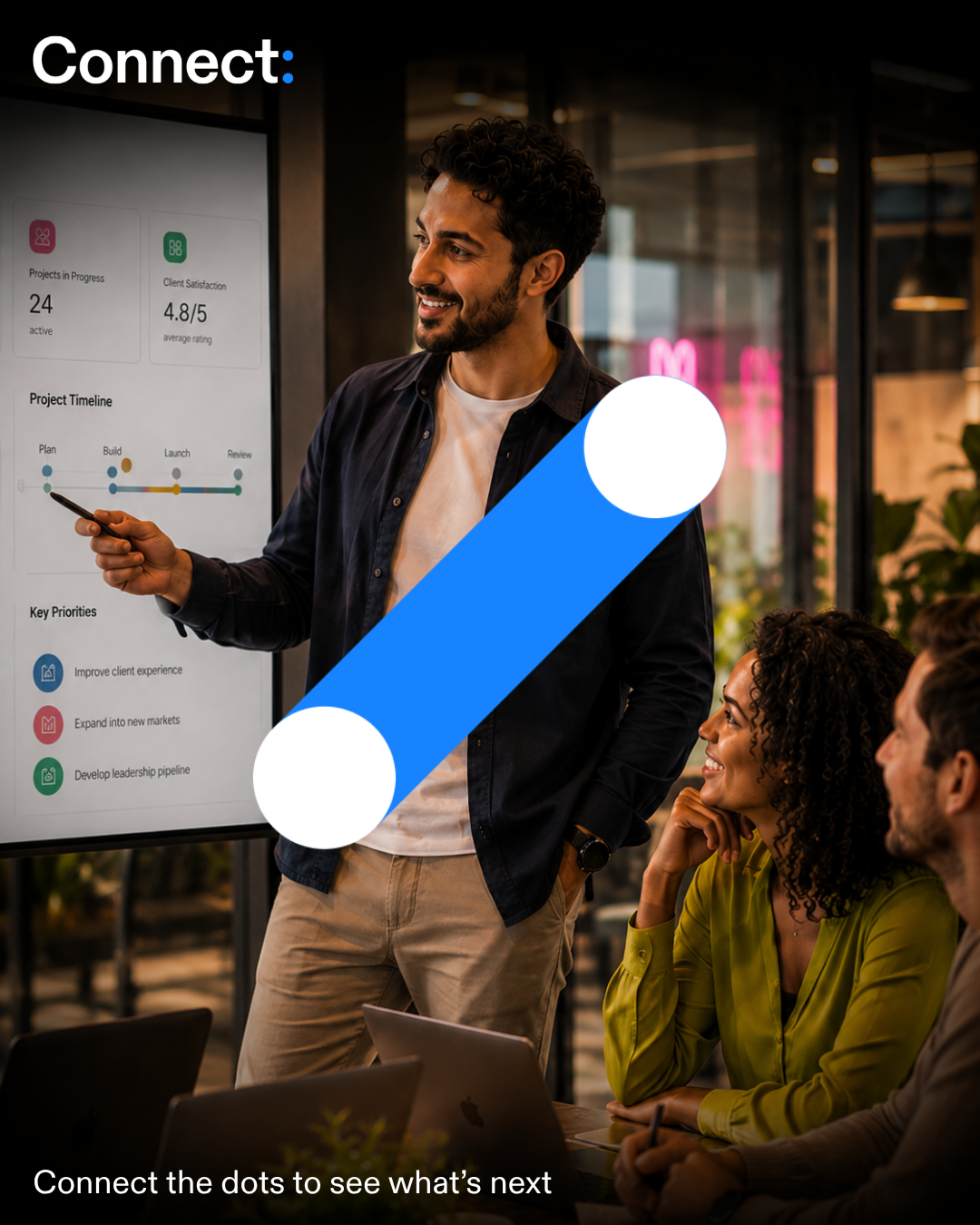 A business trainer presenting growth results to an engaged team in a workshop